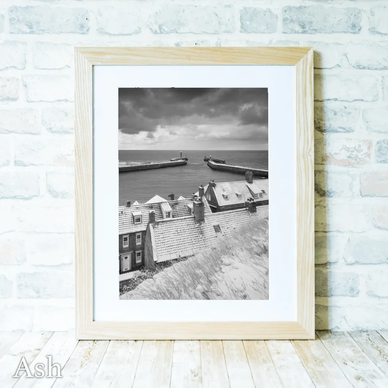 Fresh Snowfall On Whitby Piers 5 Fresh Snowfall On Whitby Piers - Ash-Portrait-Frame