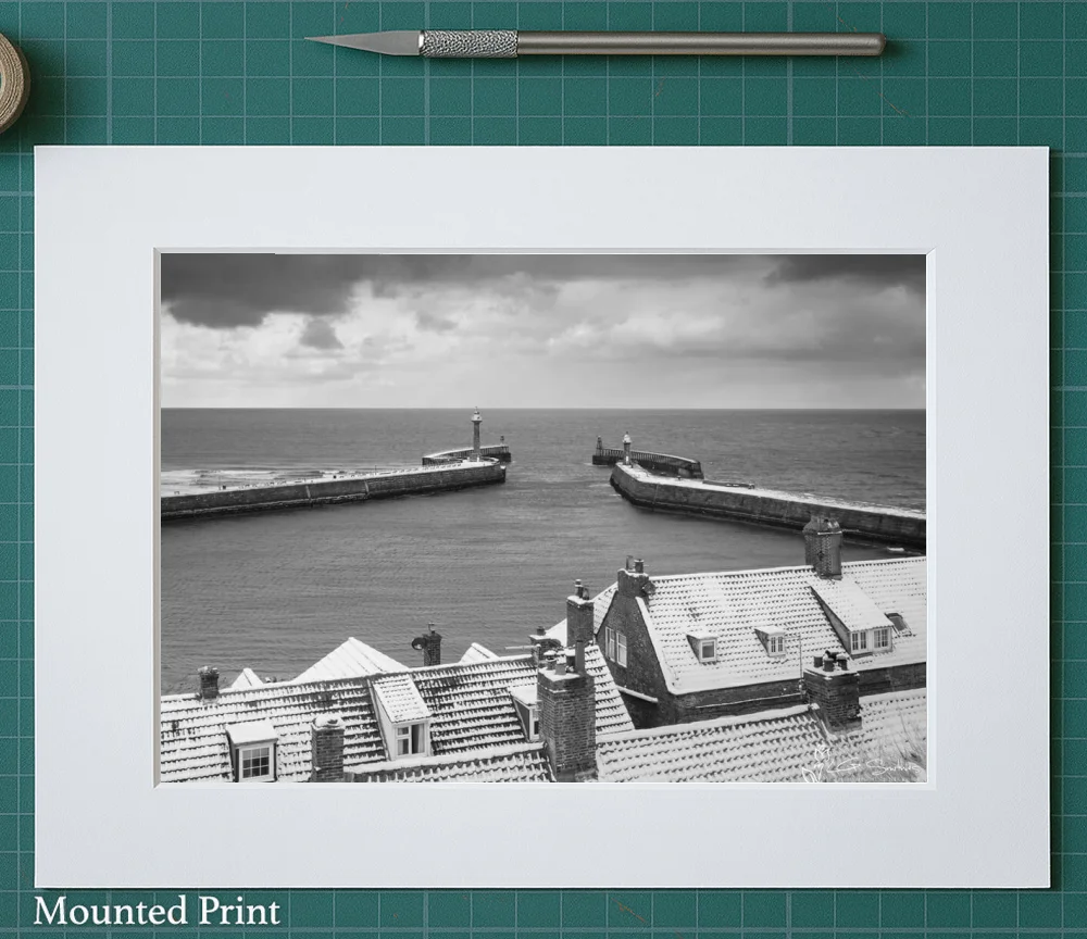 Fresh Snowfall On Whitby Rooftops and Piers 2 Fresh Snowfall On Whitby Rooftops and Piers - Landscape-Mounted-Print