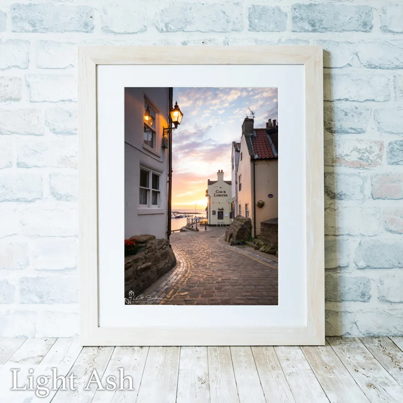 Staithes Sunrise By The Cod And Lobster 2 Staithes Sunrise By The Cod And Lobster - Light-Ash-Portrait-Frame