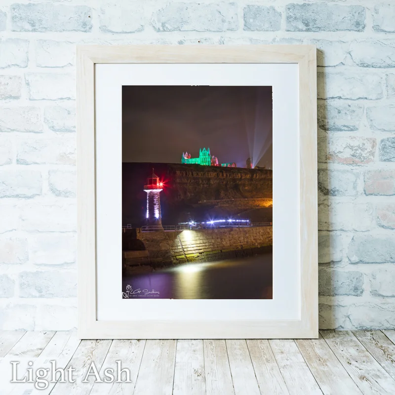 Whitby Lighthouse And Illuminated Abbey 2 Whitby Lighthouse And Illuminated Abbey - Light-Ash-Portrait-Frame
