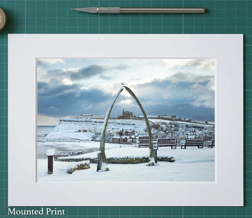 Whitby’s Whalebones And Abbey After Snowfall 2 Whitby’s Whalebones And Abbey After Snowfall - Landscape-Mounted-Print